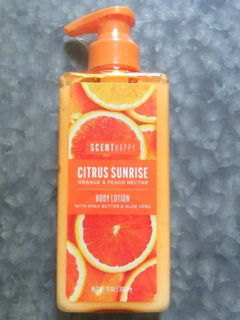 NIP Citrus Sunrise Scent Happy Body Lotion 13 oz. in factory plastic seal